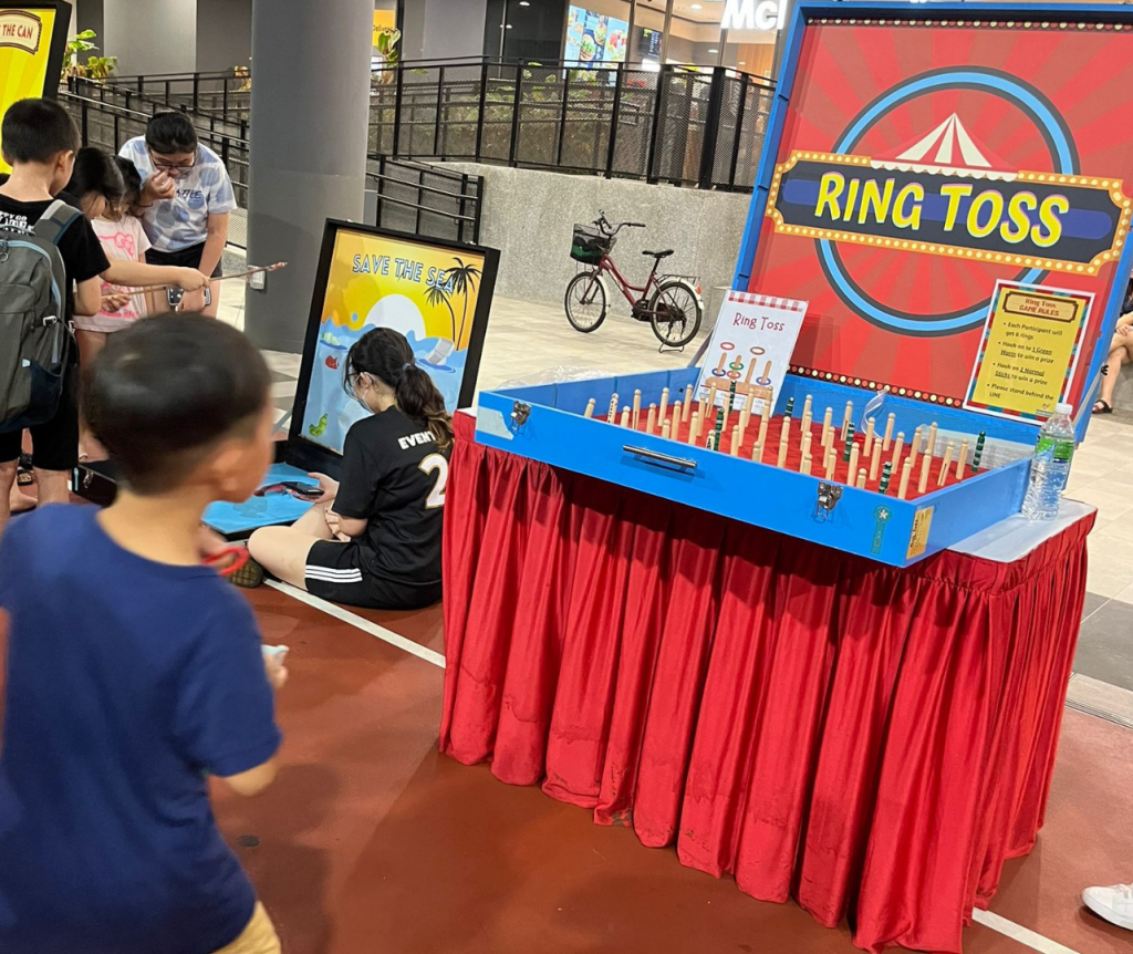 Professional Ring Toss game booth setup at Singapore corporate event